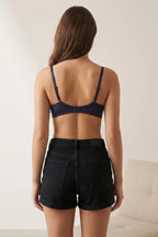 Cosima Wired Push Up Bra Navy – Back view on model showing hook closure