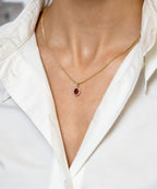 Oval Ruby Pendant Set with Diamond Halo