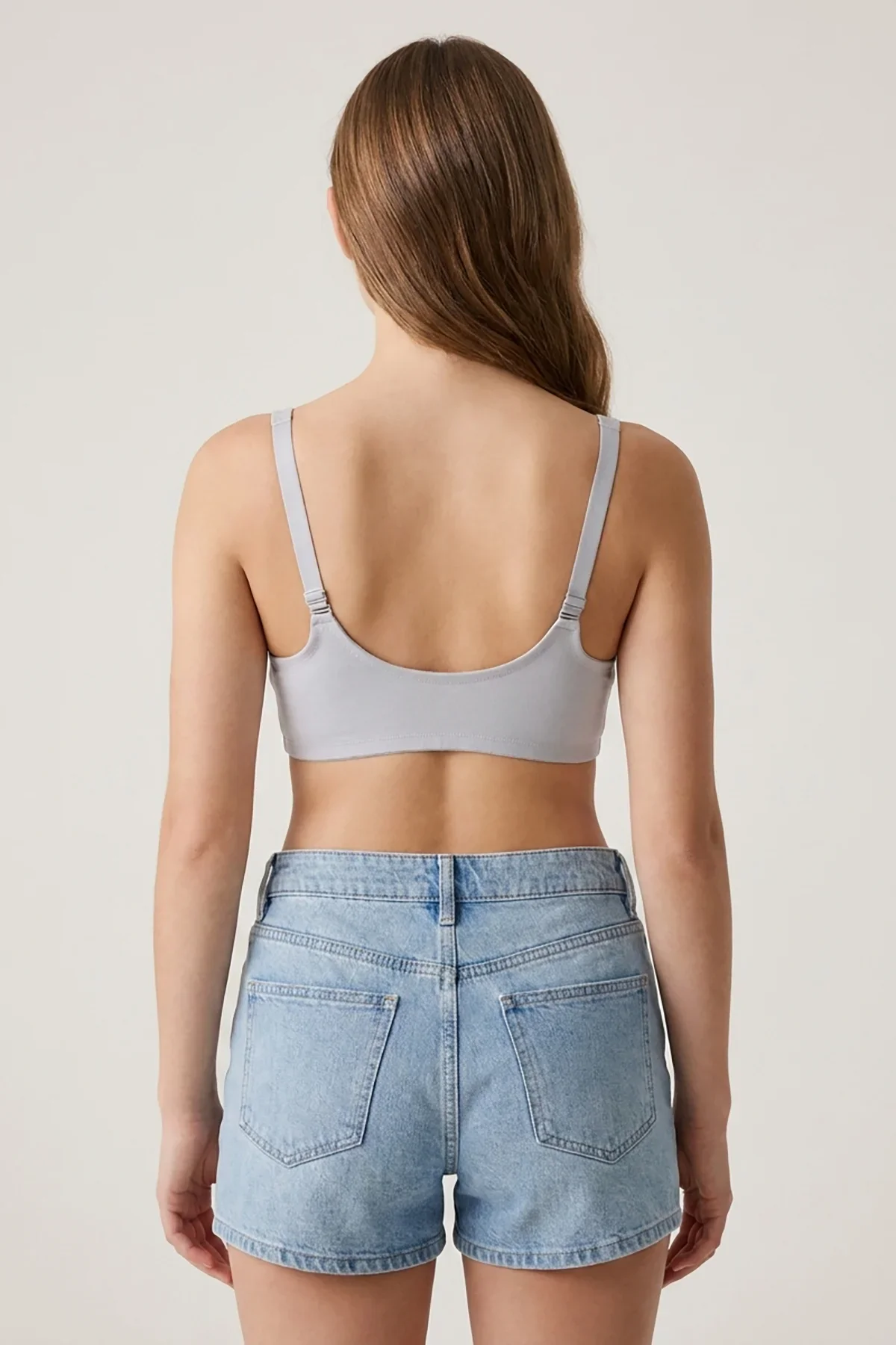 Front Open Bra Grey – Back view on model showing smooth back and adjustable straps
